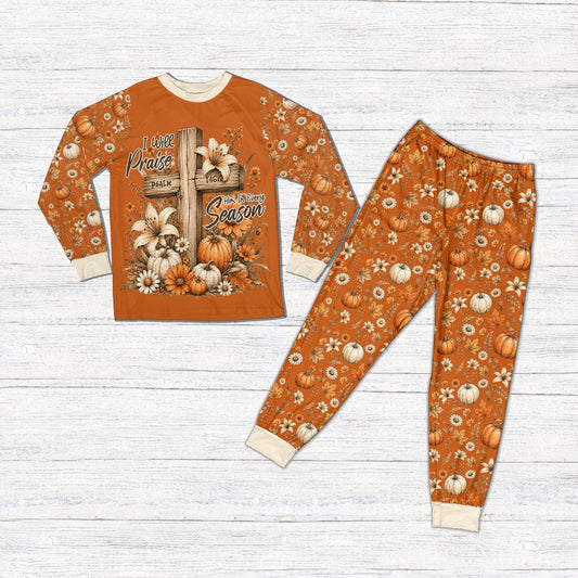 Matching pajamas for family featuring wooden cross and pumpkin design