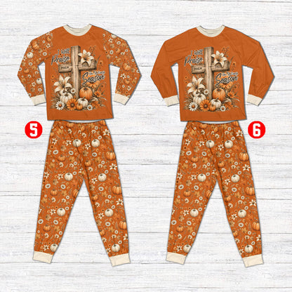 Front view of the orange pumpkin patterned pajama pants