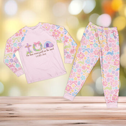 Pink long-sleeve top faith pajama set with pastel patterned sleeves and pants, front view