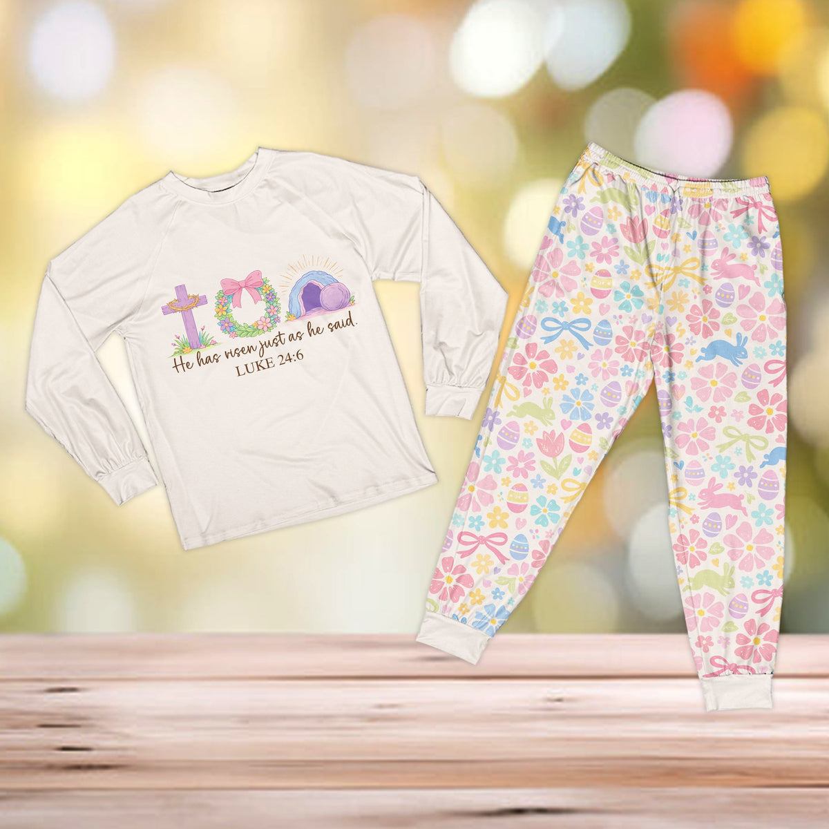 White faith pajama set top with matching pastel patterned pants, front view