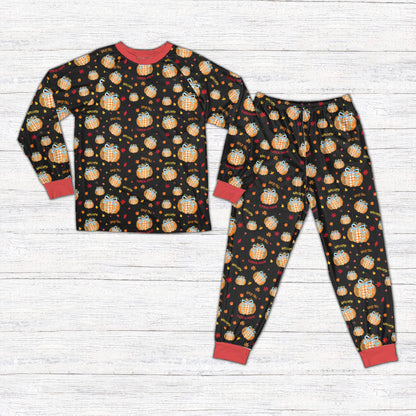 Fall pajama set in black with colorful pumpkin and leaves design