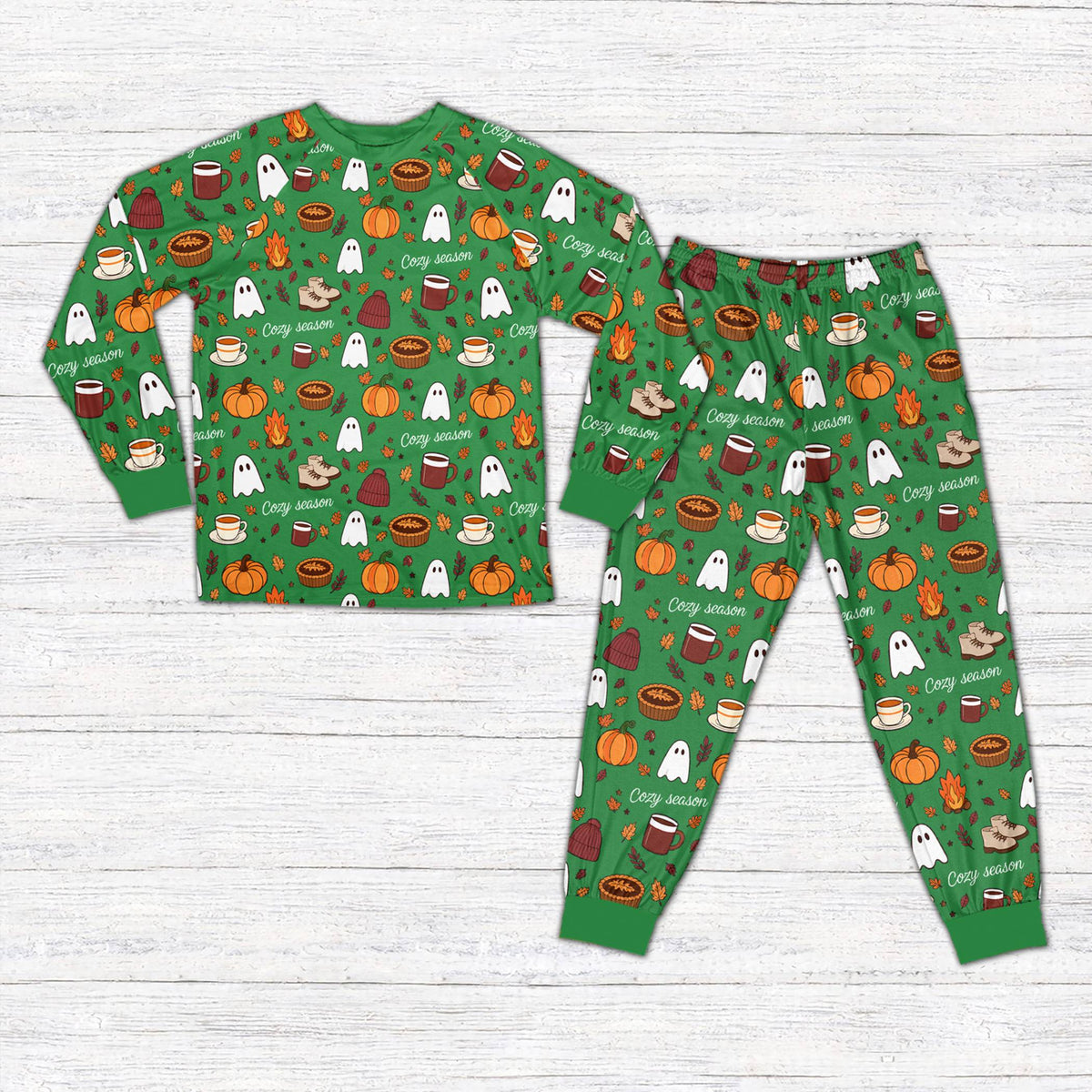 Green fall pajama set with autumn theme, front view