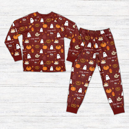 Maroon fall pajama set with pumpkins and campfires pattern, front view