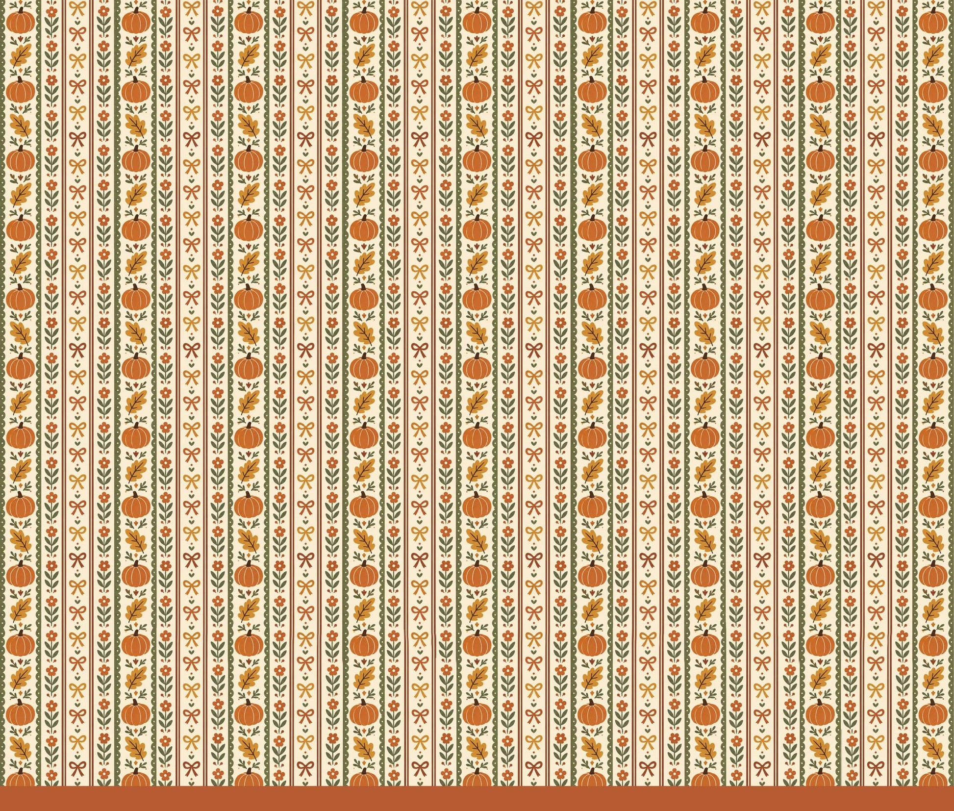 Close-up detail showing the pumpkin, oak leaf, and floral vine pattern on the pajama fabric
