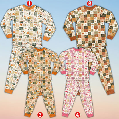 Fall pajama set featuring an autumn patchwork pattern of pumpkins and plaid, additional front view