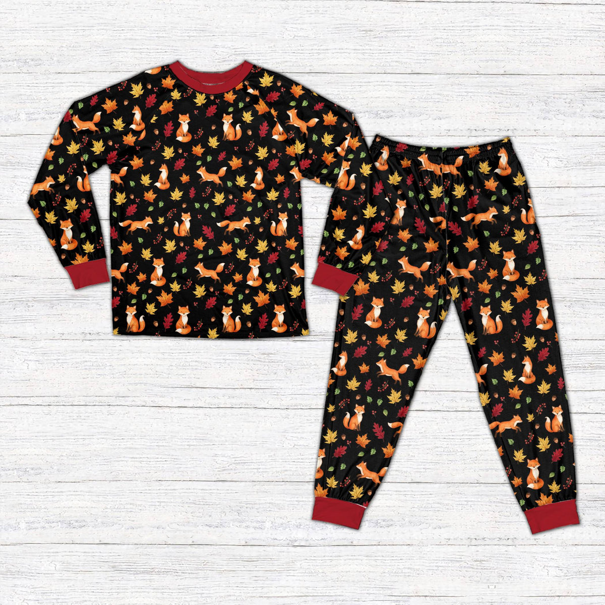 Close-up front view of the fox and acorn pattern on the fall pajama set