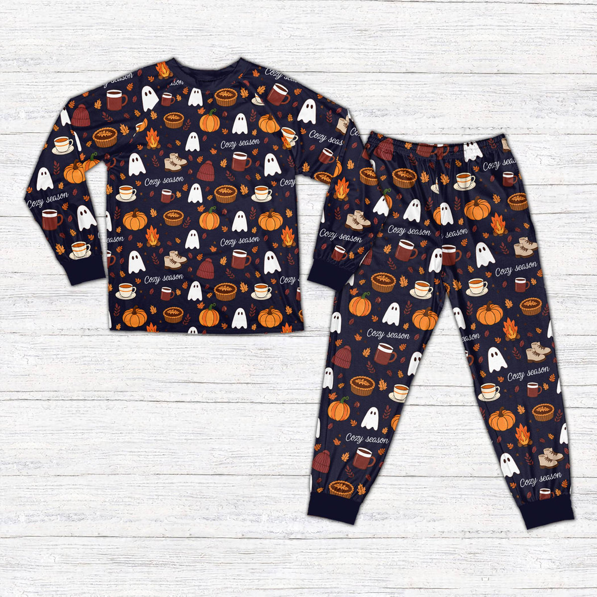 Navy fall pajama set featuring coffee mugs and beanies, front view