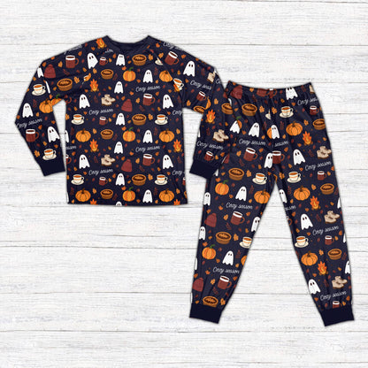 Navy fall pajama set featuring coffee mugs and beanies, front view