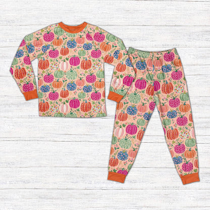 Pink front view of the personalized autumn pajama set with floral pumpkins