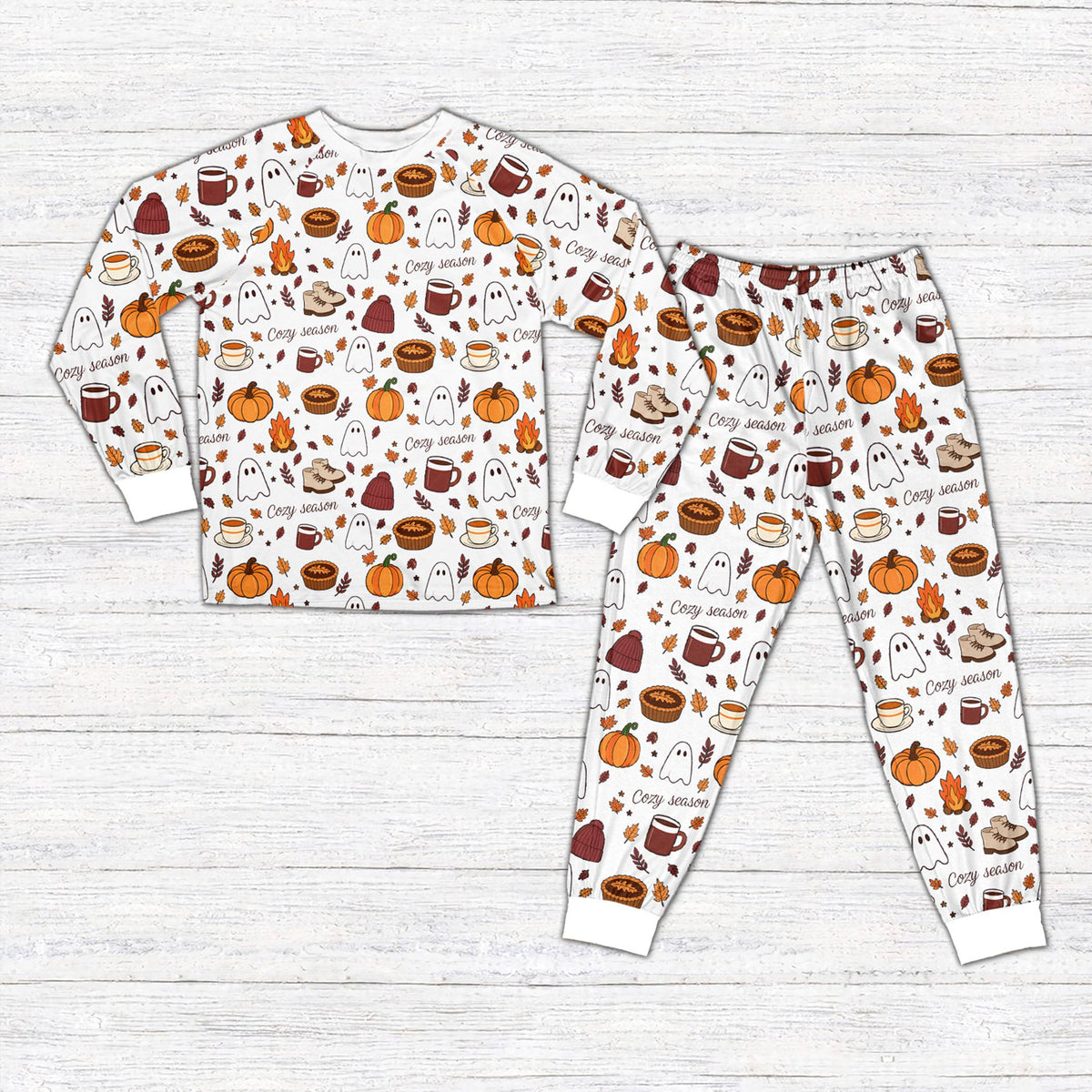 White fall pajama set featuring cozy season autumn illustrations, front view