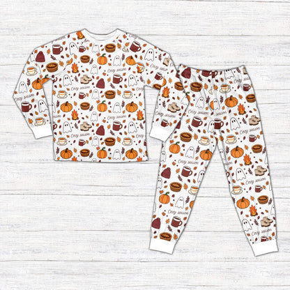 White fall pajama set featuring cozy season autumn illustrations, front view
