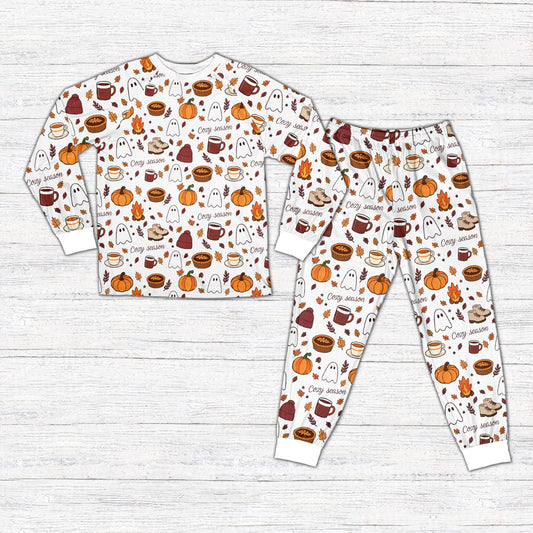 White fall pajama set featuring cozy season autumn illustrations, front view