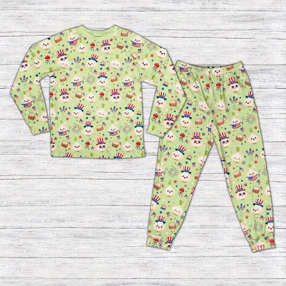 Green matching family fourth of july pajama set featuring a garlic BBQ design, front view