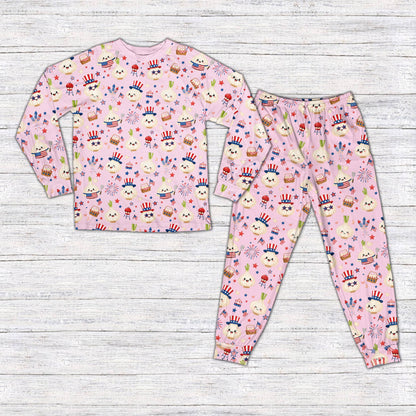 Pink matching family fourth of july pajama set featuring a garlic BBQ design, front view