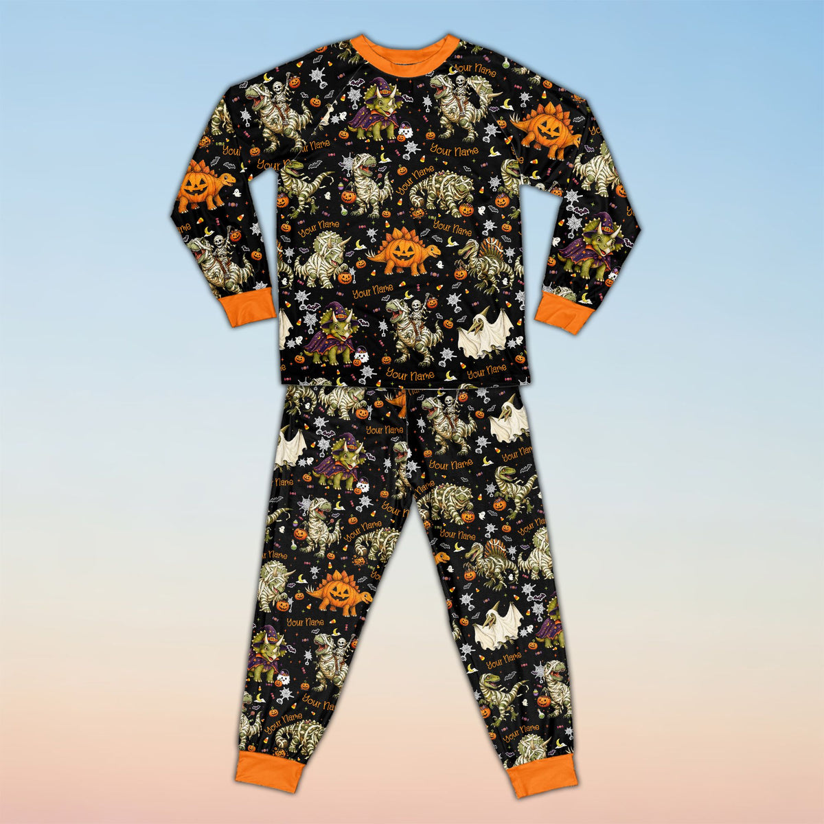 Front view of personalized black Halloween dinosaur pajama set
