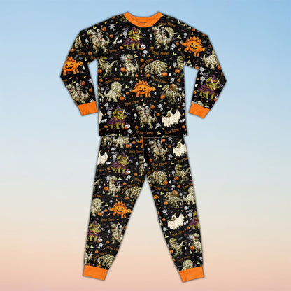 Front view of personalized black Halloween dinosaur pajama set