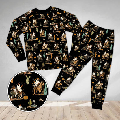 Black matching family holiday pajamas featuring ghost rider, front view