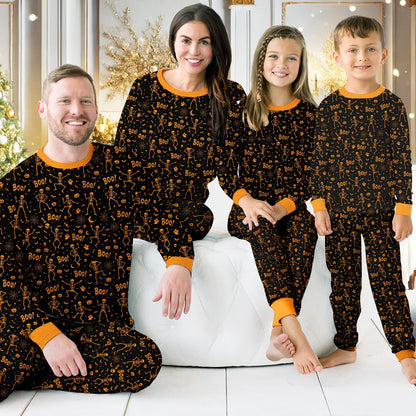 Another lifestyle view of the matching family Halloween pajama set being worn