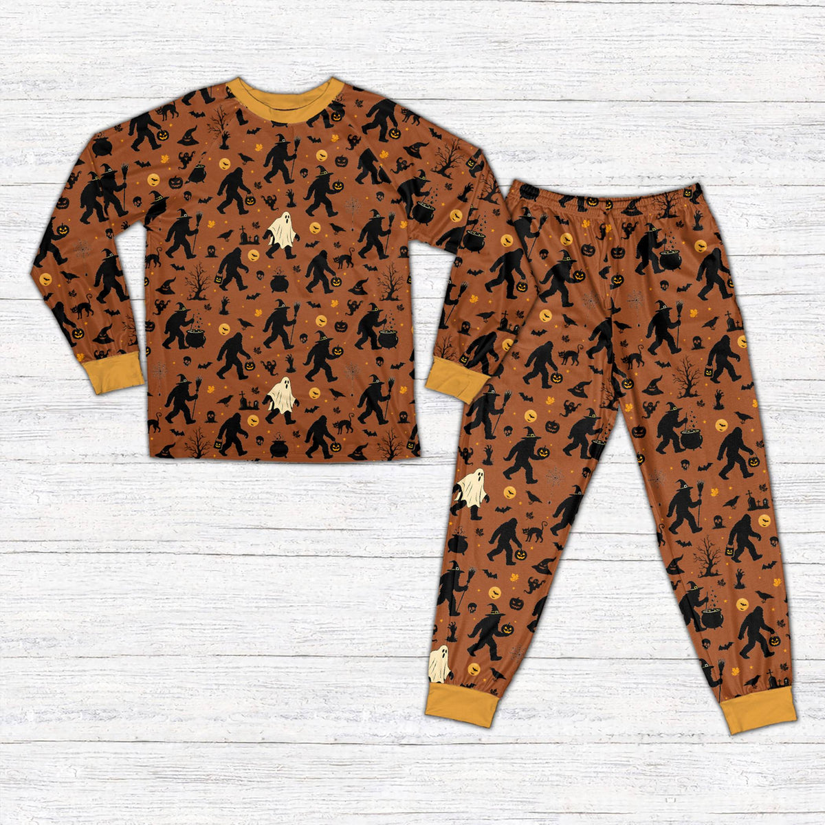 Front view of a different style brown Halloween pajama set with Bigfoot theme