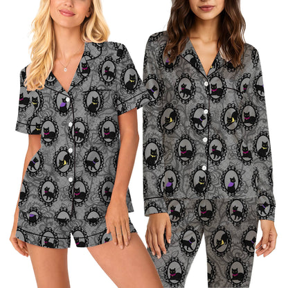 Front view of the halloween cats pajama set featuring black cats and gothic frames on a gray floral background