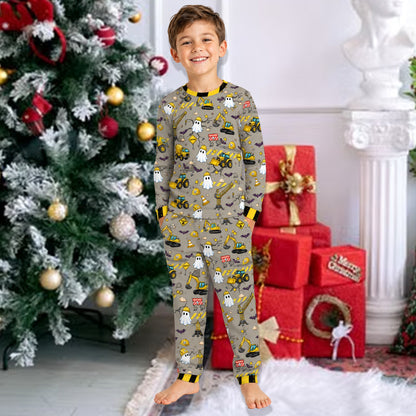 Another lifestyle view of the personalized Halloween construction pajama set.