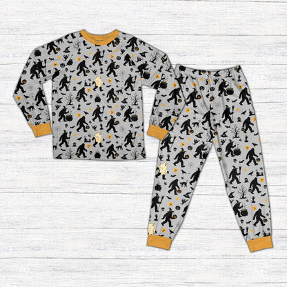Front view of gray Halloween pajama set with Bigfoot and jack-o'-lantern design