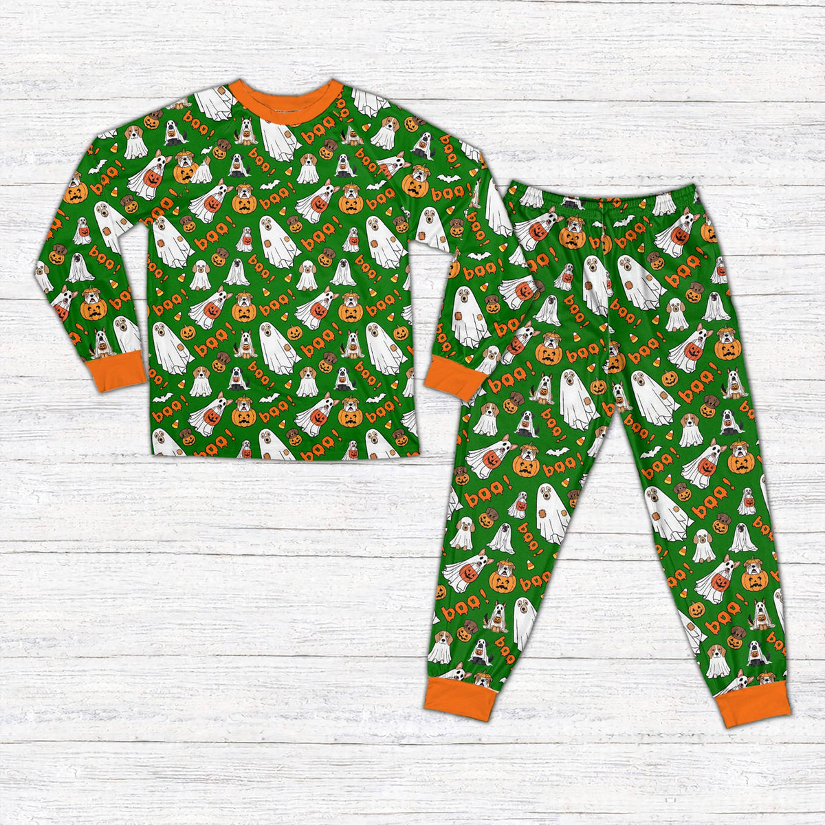 Green background matching holiday pajamas family set front view