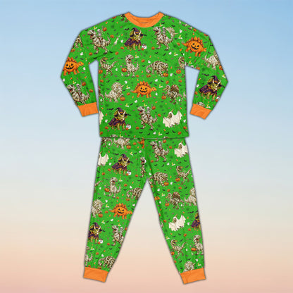 Front view of personalized green Halloween dinosaur pajama set