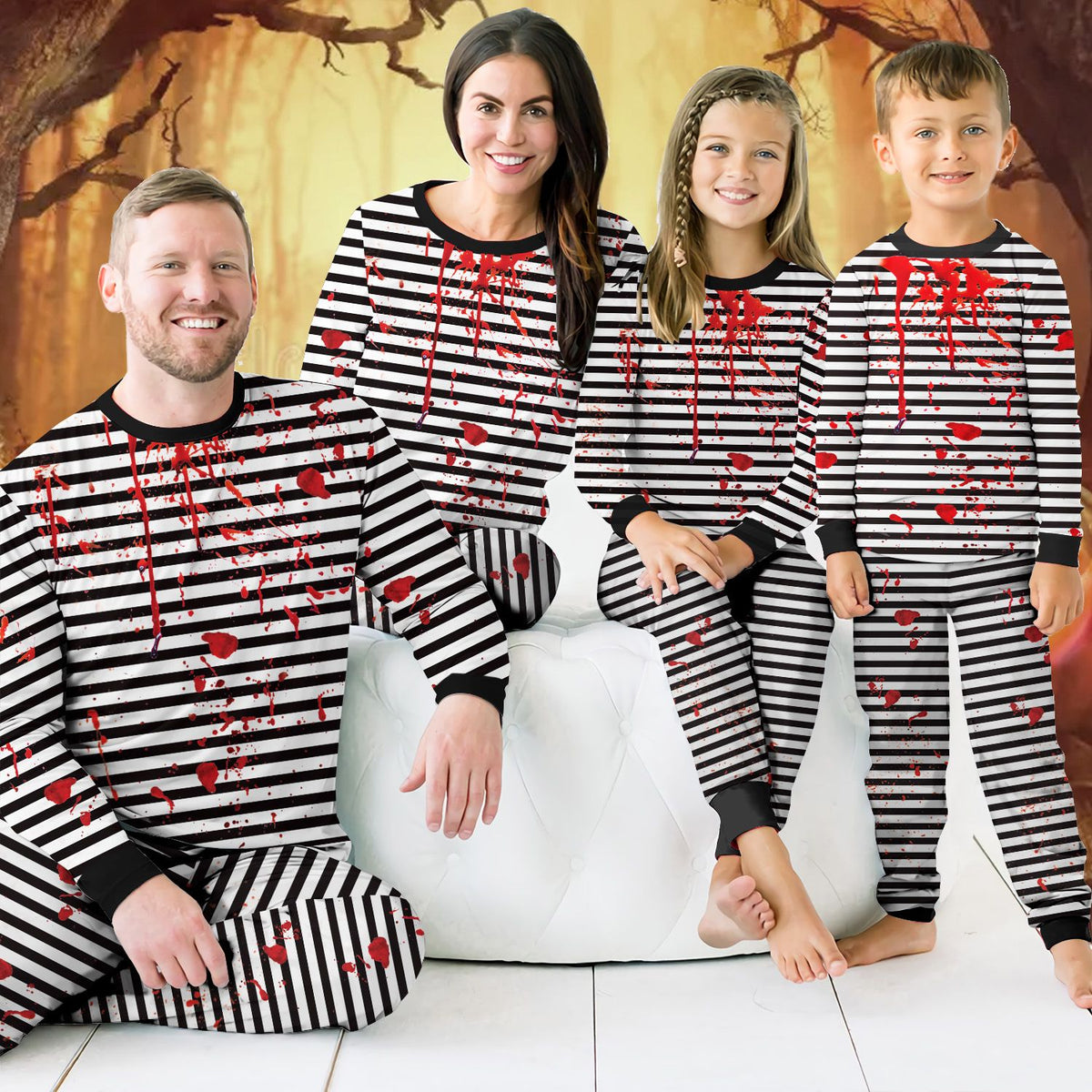 Second lifestyle view showing the family pajamas matching in a spooky setting