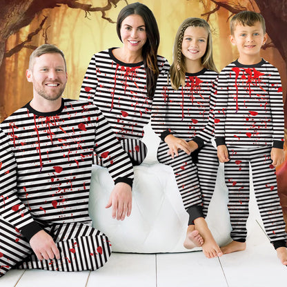 Second lifestyle view showing the family pajamas matching in a spooky setting