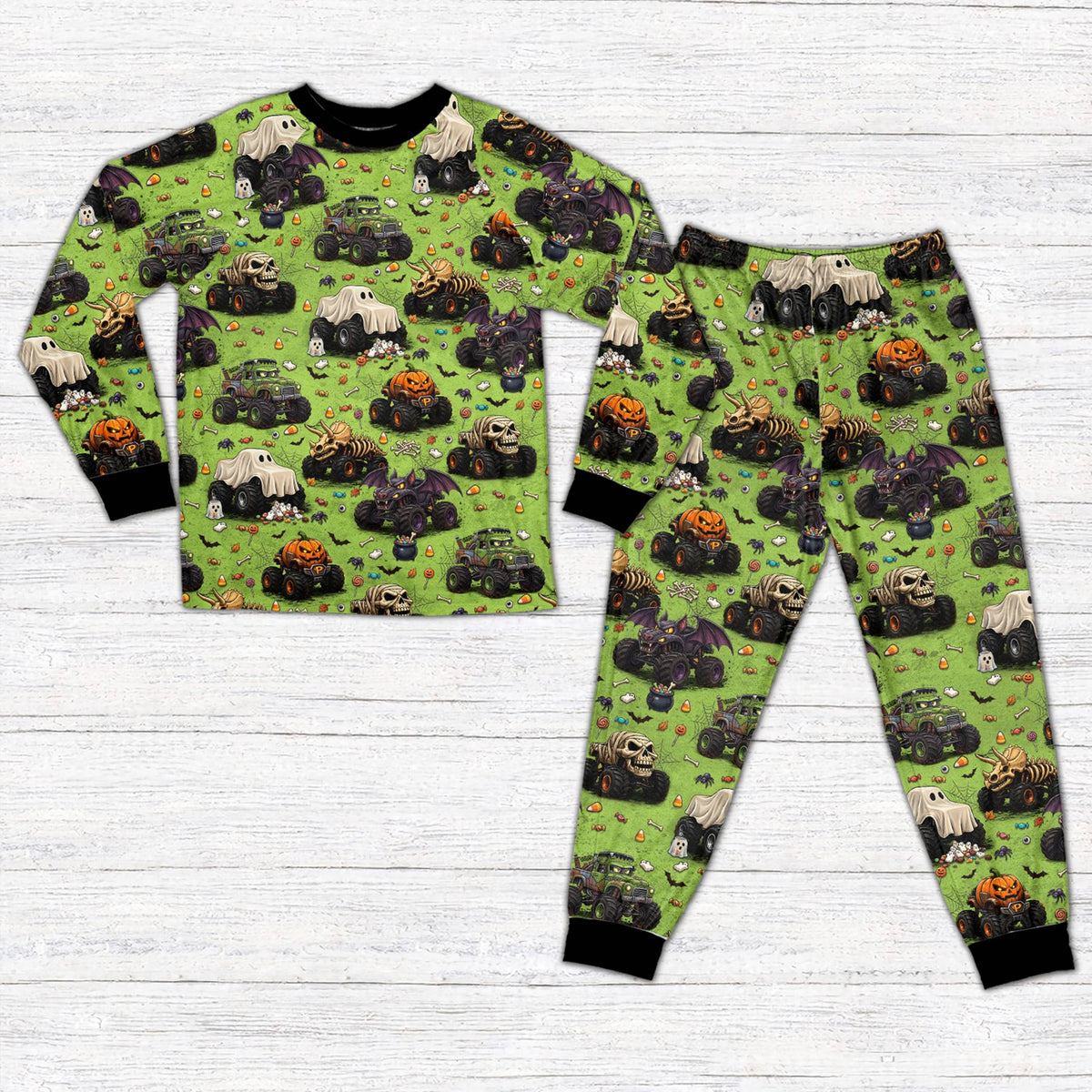 Front view of the green halloween monster trucks pajama set featuring custom name and number