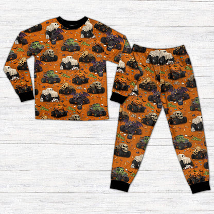 Close-up front view of the Halloween monster trucks pajama top and bottom