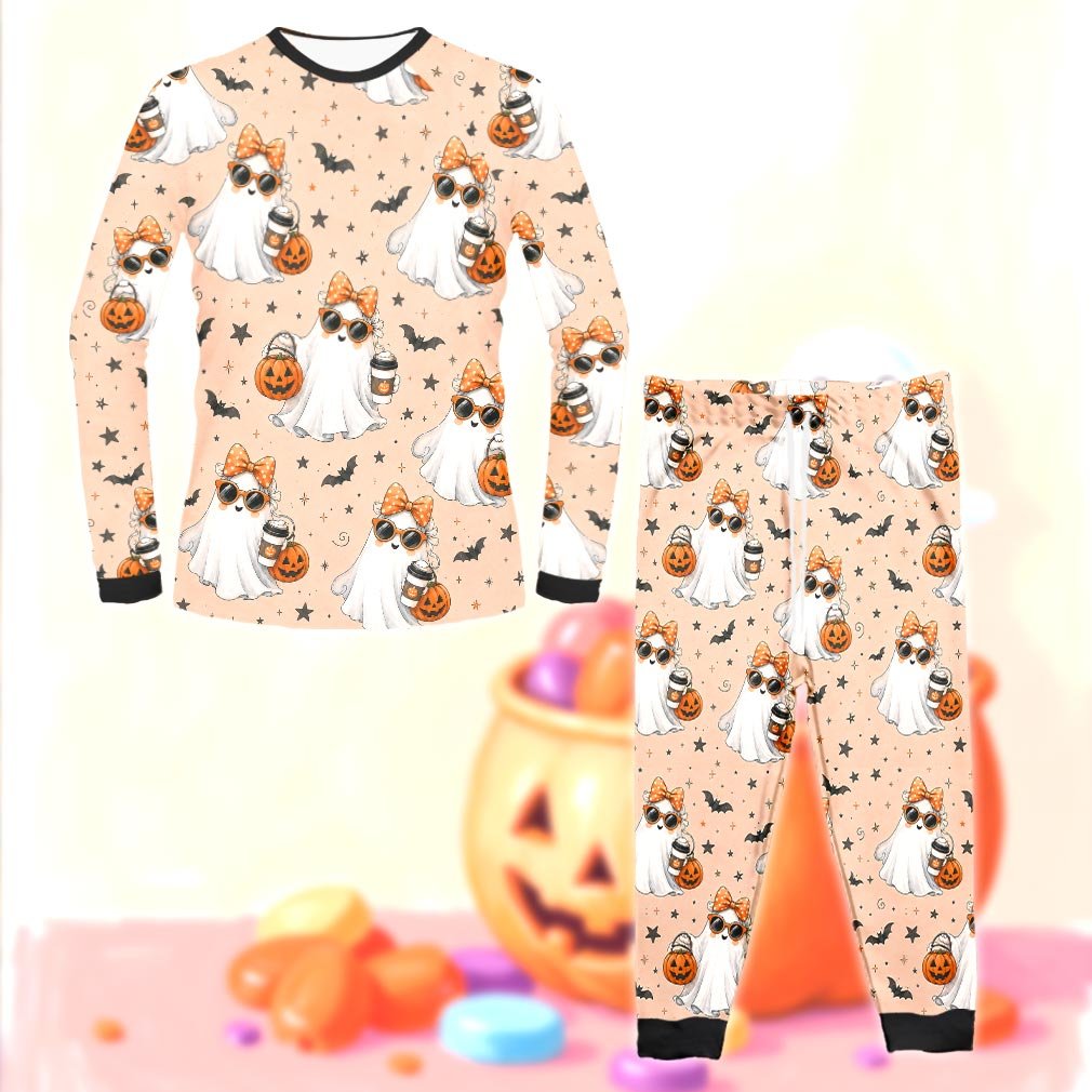 Close up of the cartoon ghost and bat pattern on the Halloween pajama set, front view