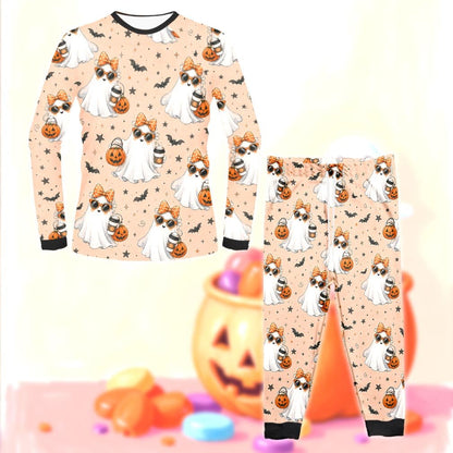 Close up of the cartoon ghost and bat pattern on the Halloween pajama set, front view