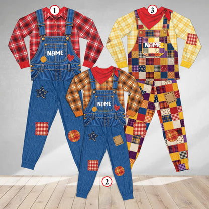 Detailed front view of the printed overalls and bandana necktie design