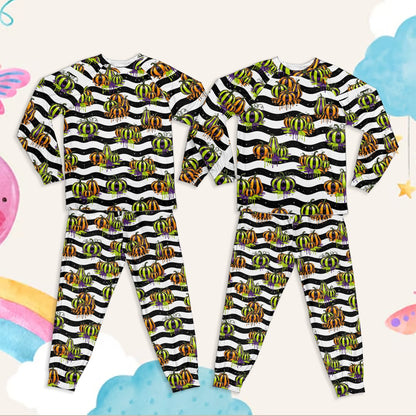 Close-up front view of the striped matching family pajama set