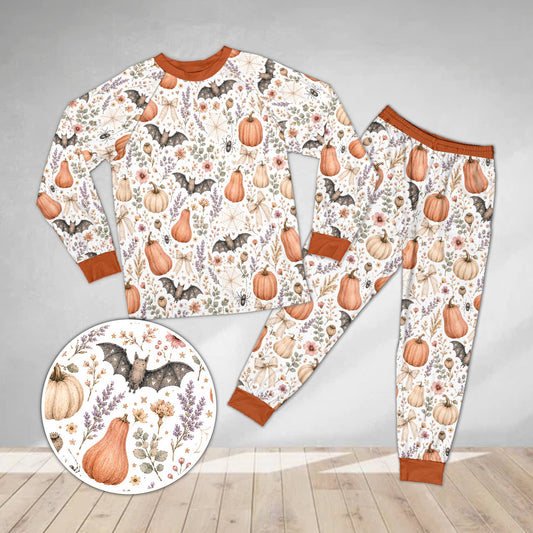 Vintage watercolor style matching family halloween pajama set featuring pumpkins and bats
