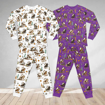 Multicolor matching holiday pajamas family set with desert print, front view
