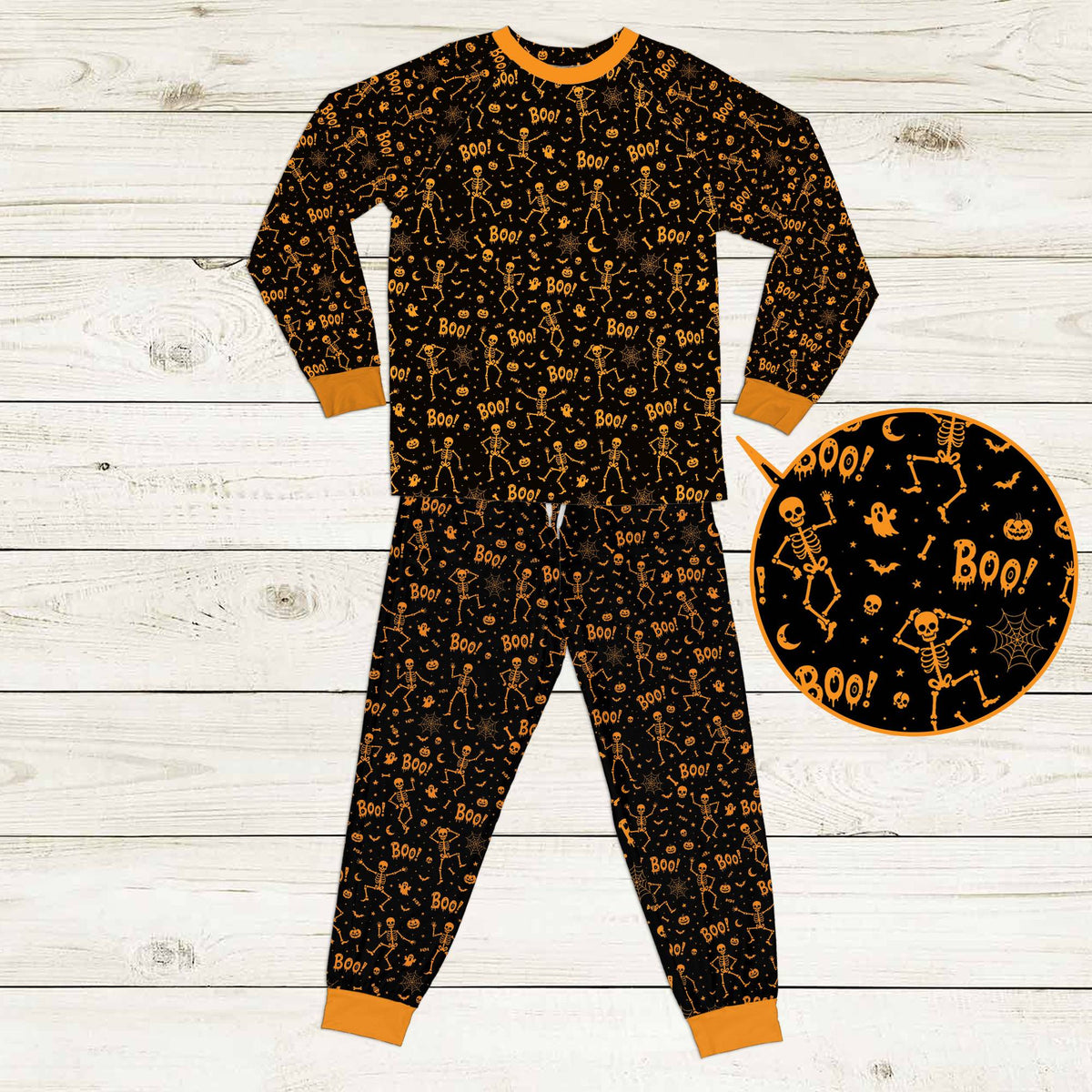 Detailed front view of the Halloween pajama set showcasing the orange contrasting cuffs