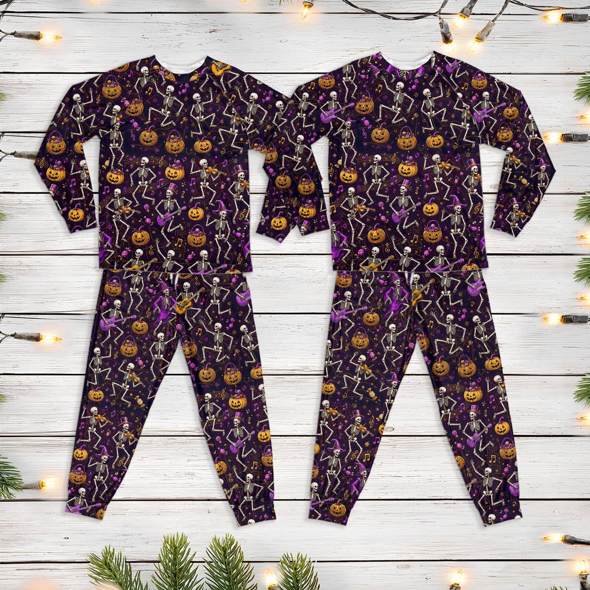 Front view of the dark purple Halloween pajama set with dancing skeletons