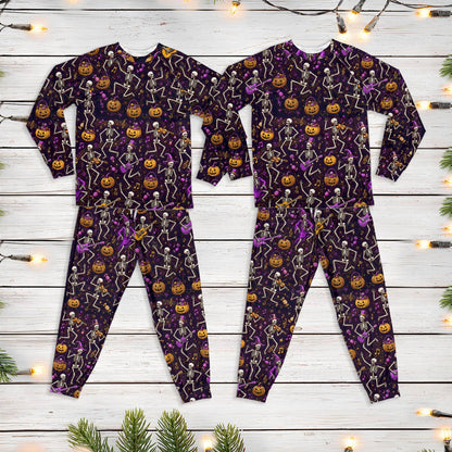 Front view of the dark purple Halloween pajama set with dancing skeletons