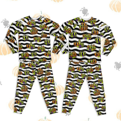 Front view of the halloween pajama set showing the neon green, orange, and purple pumpkins