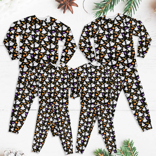 Matching family halloween pajama set with ghosts, pumpkins, and candy pattern, main view