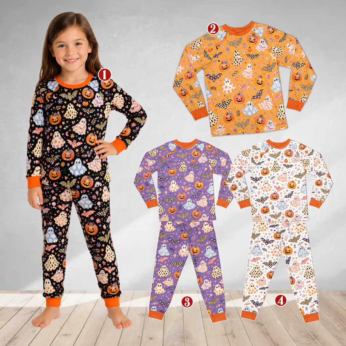 Family wearing matching holiday pajamas with whimsical Halloween print, lifestyle view