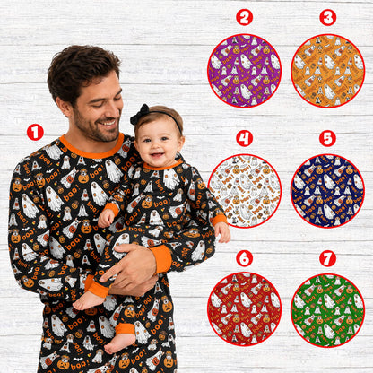 Lifestyle image of the halloween pajama set showing the playful dog and ghost pattern