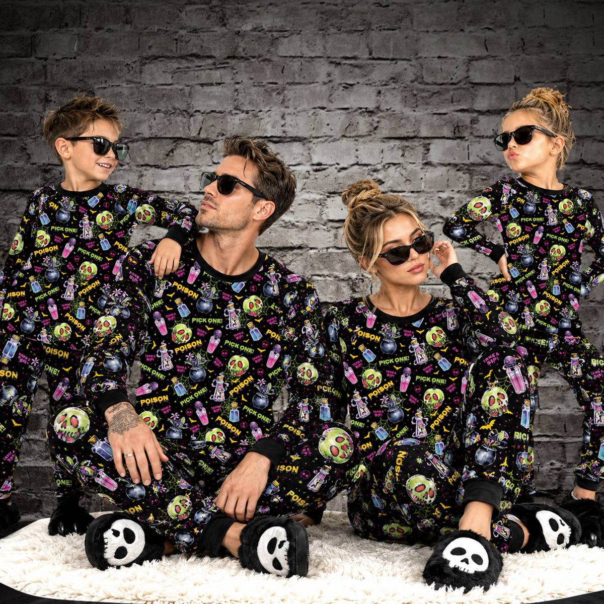 Lifestyle view of a family wearing the Halloween pajama set
