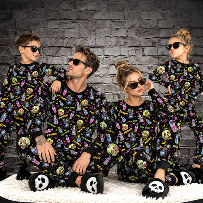 Lifestyle view of a family wearing the Halloween pajama set