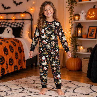 Lifestyle view of people wearing the matching holiday family pajamas with Halloween prints