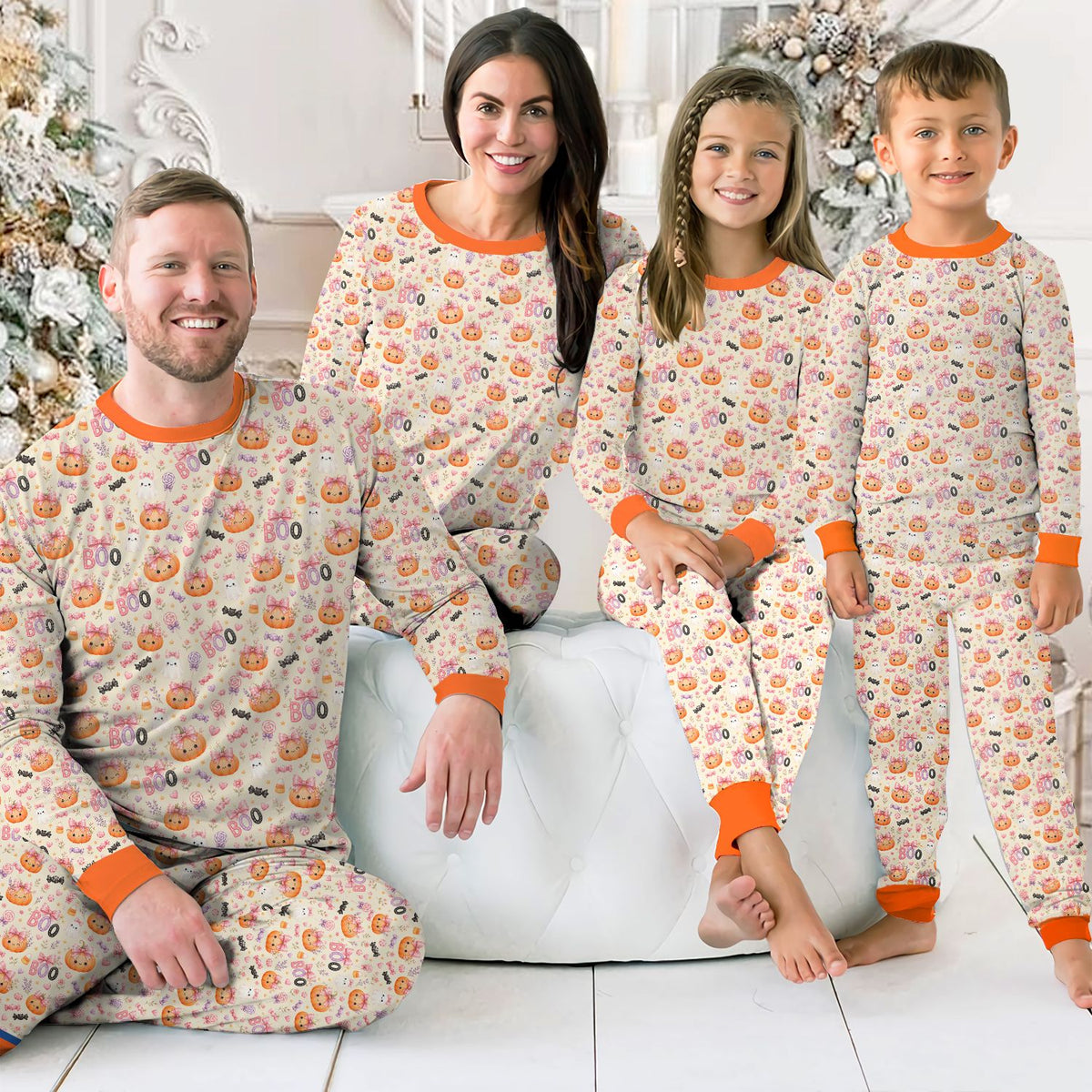 Lifestyle view of a family wearing the matching halloween pajama set