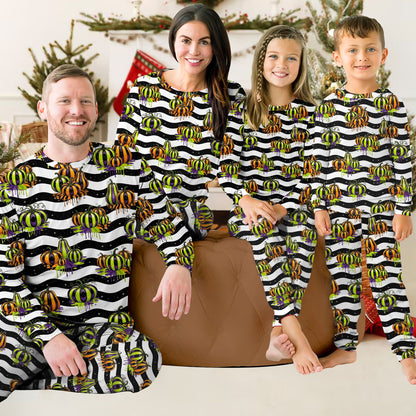 Lifestyle view of a family wearing the matching pajamas for family